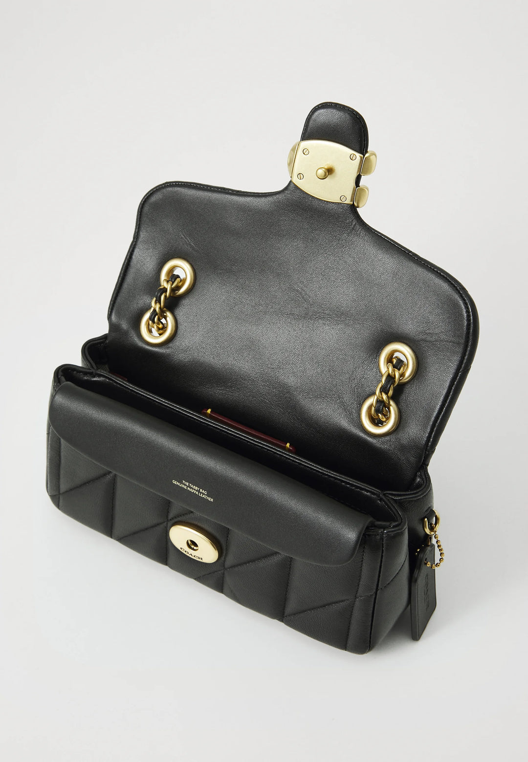 Coach™ | Quilted Pillow Tabby