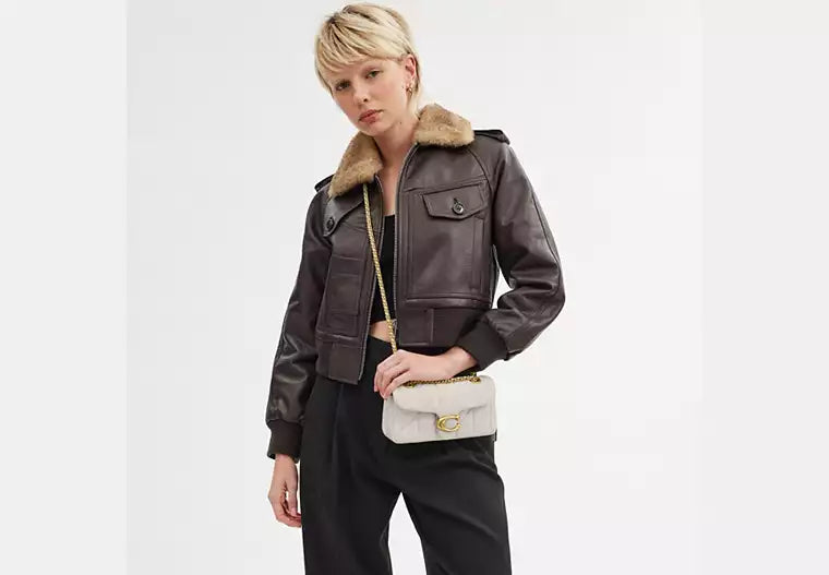 Coach™ | Quilted Pillow Tabby